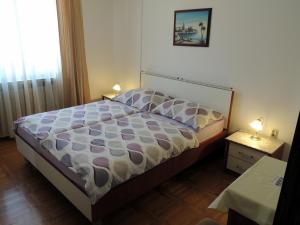 Postel nebo postele na pokoji v ubytování Rooms Stefania