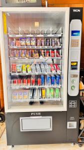 a refrigerator filled with lots of food and drinks at شقق زهرة النزلاء المخدومة الخرج in Al Kharj