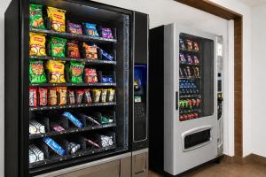 a refrigerator filled with lots of food and drinks at Hi! Monterrey Aeropuerto in Monterrey