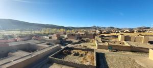 an aerial view of a village in the mountains at Auberge Chez Bassou Agoudal in Agoudal