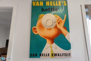 a poster of a woman with a magnifier in her eye at Beachside Largs Bay Pet Friendly 3 Bed Haven in Birkenhead