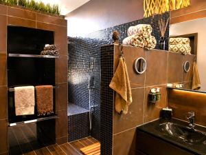 a bathroom with a shower and a sink at Spacious Apartment near Lake Maggiore in Luino