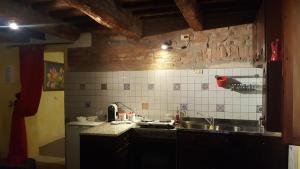 Kuchyň nebo kuchyňský kout v ubytování Appartamento Ferro di Cavallo + 19 fotografií