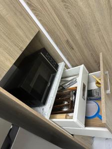 a microwave oven in a drawer in a kitchen at Little friend #1 Two balconies,elevator in Boca Chica