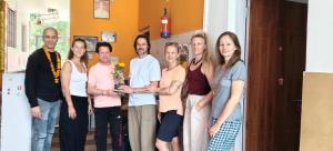 a group of people posing for a picture in a room at MOHAN GANGA VIEW HOMESTAY in Uttarkāshi