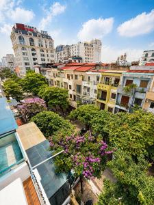 a view of a city with buildings and flowers at Giang Ninh Hotel - Korean Town Bac Ninh in Bồ Sơn +34 photos