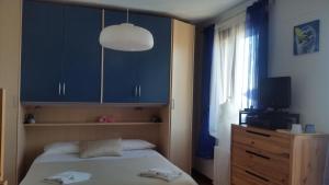 Postel nebo postele na pokoji v ubytování B&B Ariadamare