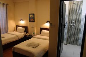 Postel nebo postele na pokoji v ubytování Hotel Buddha Land + 37 fotografií