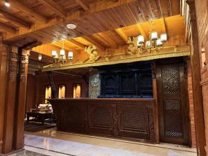 a lobby with a bar in a building at Hotel Dachi Kathmandu - Bhaktapur in Bhaktapur