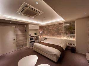gull HOTEL tesisinde bir odada yatak veya yataklar