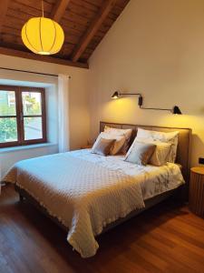 a bedroom with a large bed and a window at Villa Maranta in Slano +56 photos
