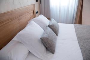 Posteľ alebo postele v izbe v ubytovaní Sa Voga Hotel & Spa