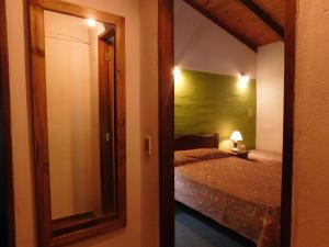 Tempat tidur dalam kamar di El Agora