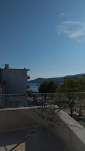 a view of a balcony with a view of the water at Aquamarine Centrale in Kavála