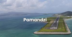 an aerial view of an airport runway next to the water at ZAYON - Villa AB Anziz in Pamandzi