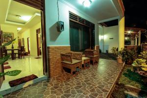 Χώρος καθιστικού στο Griya Langen Guesthouse
