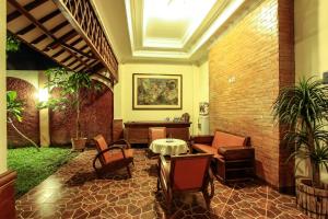 Χώρος καθιστικού στο Griya Langen Guesthouse
