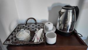 a tray with a blender and cups on a table at wild elephant reach wilpaththuwa in Nochchiyagama