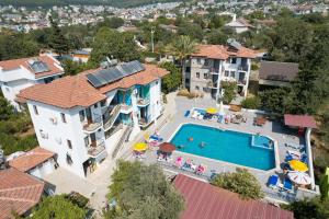 an aerial view of a house with a swimming pool at Köseoğlu Apart Villa in Fethiye