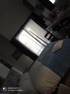 a bedroom with a bed and a window in a room at Casa Angelene in Vitorchiano +4 photos