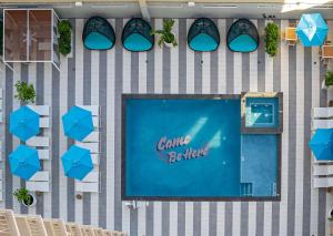 an overhead view of a game retailer sign on a building at OUTRIGGER Waikiki Paradise Hotel in Honolulu