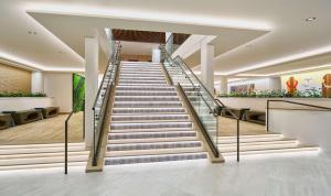 a set of stairs in a lobby at OUTRIGGER Waikiki Paradise Hotel in Honolulu