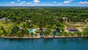 an aerial view of a resort in the water at The Cove Pasikuda - Eco Retreat in Pasikuda