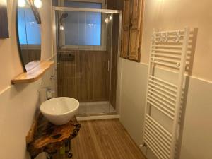 a bathroom with a shower and a white sink at Mamma Adelina in Enna +78 photos