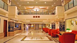 Ruang duduk di Aditya Park-A Sarovar Portico Hotel