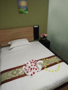 Letto o letti in una camera di Amigo Hotel