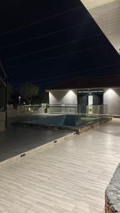 an empty parking lot at night with a skate park at شاليهات الحدبان - Al Hadban Chalets in Ash Shafa