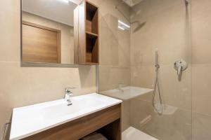 a bathroom with a sink and a shower at Park Hotel Gemona in Gemona del Friuli