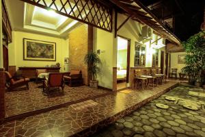 Χώρος καθιστικού στο Griya Langen Guesthouse