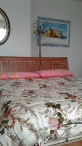 Postel nebo postele na pokoji v ubytování B&B Lo Spazio Magico