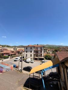 a view of a parking lot with a playground at Casa di Mary in Pontremoli