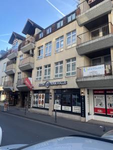 a building on the side of a city street at Pension Ksenija Hanau in Hanau am Main