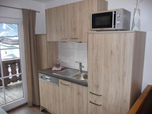 Kuchyň nebo kuchyňský kout v ubytování Haus Sandeck