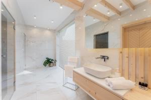a bathroom with a sink and a shower at Stasiówka in Sablówka +40 photos