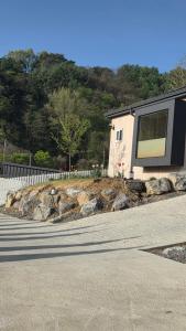 a house sitting on the side of a road at 산골민박수페쉼 in Jecheon
