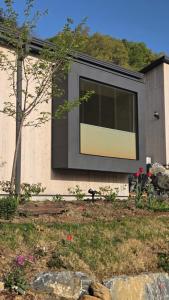 a window on the side of a house at 산골민박수페쉼 in Jecheon +98 photos