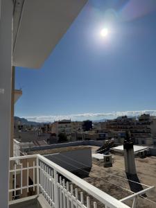 a view of a city from the roof of a building at Urban Nest Corinth in Korinthos
