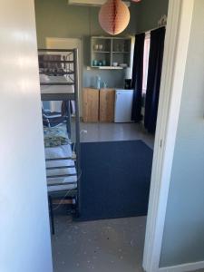 a view of a room with a kitchen and a room with a kitchen at Tängerdalens camping och café in Övertänger