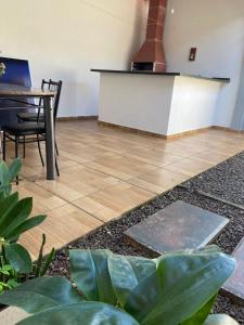 Foto de Casa confortável perto Paraguai e centro com área gourmet