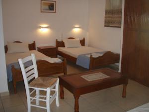 Posteľ alebo postele v izbe v ubytovaní Eros-Iros Portside Stays Skiathos