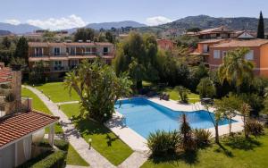 an aerial view of a resort with a swimming pool at Megusta Apartments Selianitika - Poolside Escape in Selianitika
