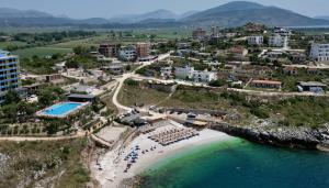 an aerial view of a resort and a beach at Apartments Vila Ardi in Sarandë