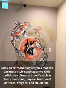 an extraordinarystay in a modern japanese style space adorned with traditional cultural art at 登福桜 動物園前駅4番出口徒歩1秒 通天閣5分 難波駅10分 大阪駅15分 関西空港直通 usj25分 in Osaka