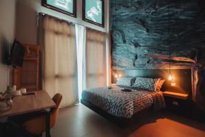 Llit o llits en una habitació de Oltre Exclusive