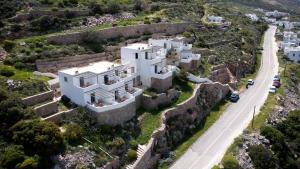 an aerial view of a castle and a road at Dimitra Studios in Aegiali