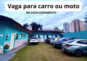 a group of cars parked in a parking lot at IMPERIAL BEACH ENSEADA 500 Metros Praia Enseada Gjá Av Professor João Batista Julião x Antonio Del Nero Enseadas jardim Virgínia Bairro Nobre in Guarujá +107 photos